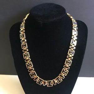 Vintage Monet gold-tone choker necklace with black/dark blue enamel accents